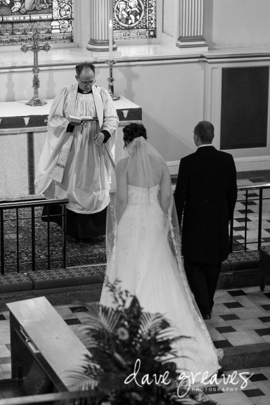Bride and Groom stand at the altar in St Mary's Church
