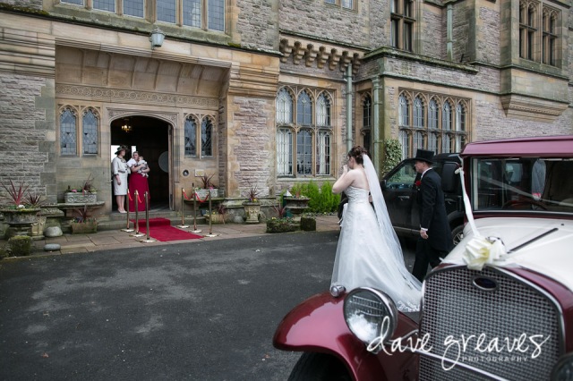 Bride and Groom arrive at Armathwaite Hall in wedding car