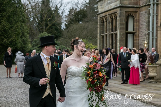 Bride and Groom lead the guests through the grounds of Armathwaite Hall