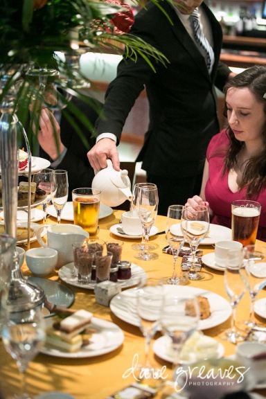 Tea being poured during a wedding reception tea party
