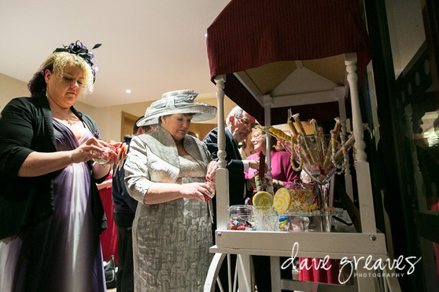 Guests help themselves to sweets from Candy Cart
